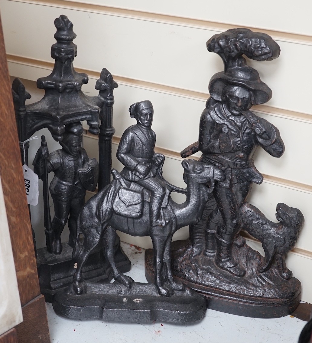 Three Victorian cast iron figural doorstops, 40cm